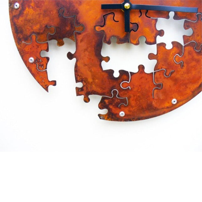Wanduhr Puzzle Design in Edelrostoptik