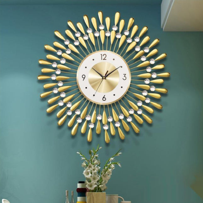 Design Wanduhr Sonne goldfarben modern