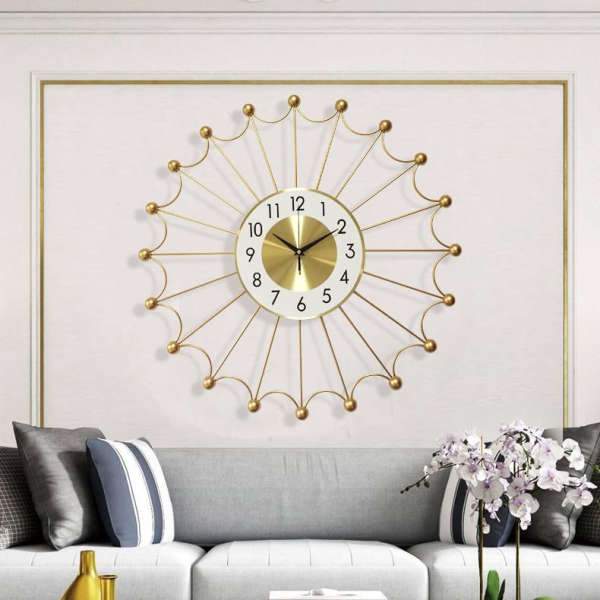 Große Wanduhr Sonne Design Goldfarben
