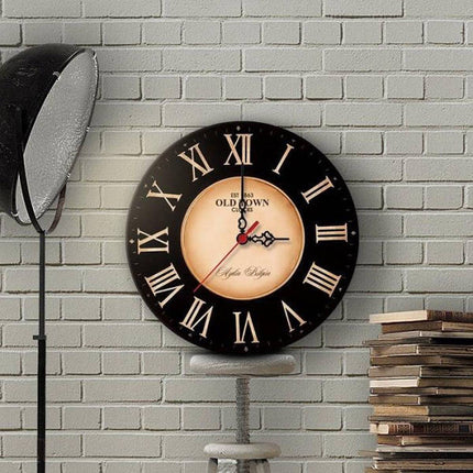 Vintage Wanduhr in Schwarz und Gold