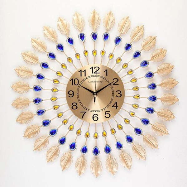 Große Wanduhr Sonne gold mit Kristallen