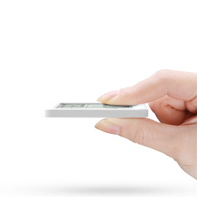 Weiße digitale Tischuhr mit Thermometer