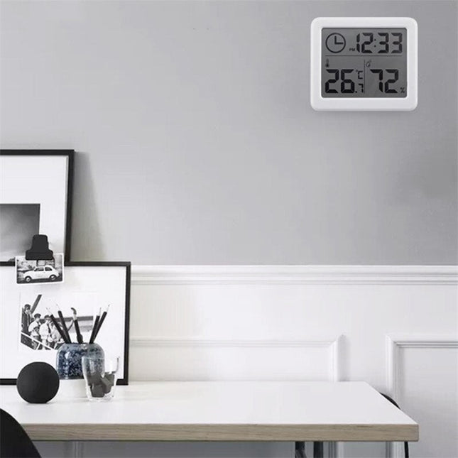Weiße digitale Tischuhr mit Thermometer