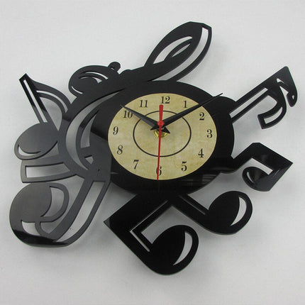 Schallplattenuhr mit Notenschlüssel als musikalisches Geschenk