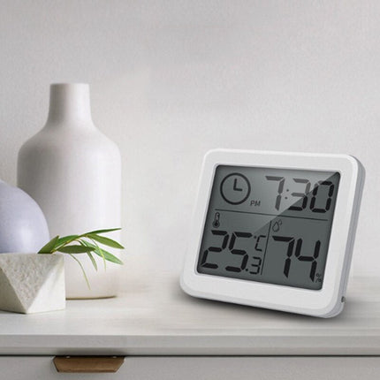 Weiße digitale Tischuhr mit Thermometer