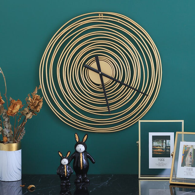 Goldene Design Wanduhr mit Spiral-Effekt