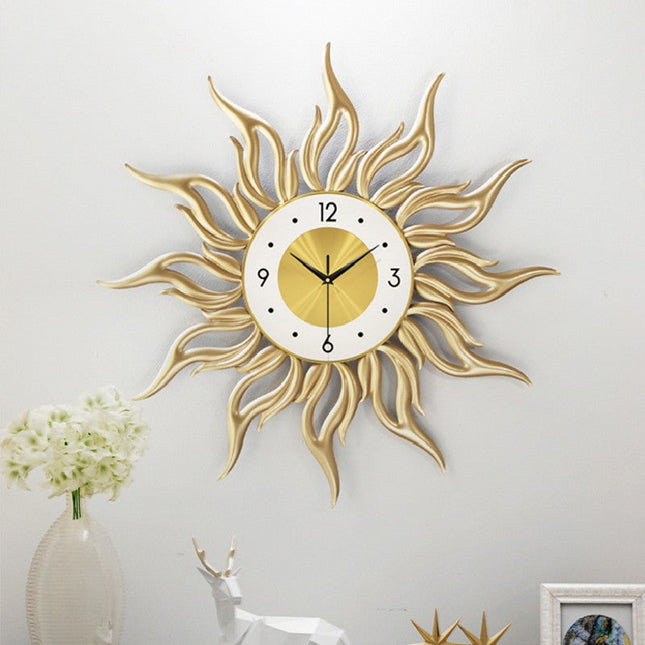 Design Wanduhr Sonne goldfarben modern