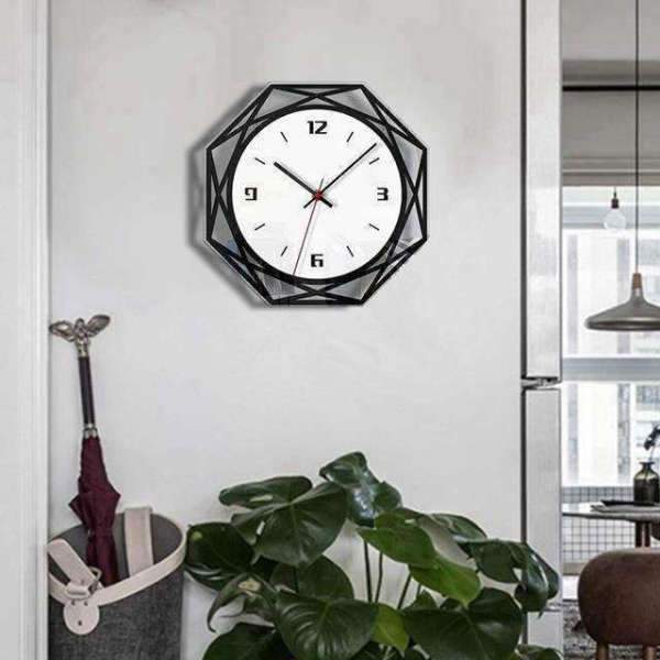 Geometrische Wanduhr schwarz-weiß achteckig
