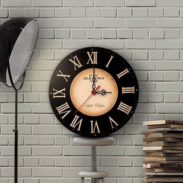 Vintage Wanduhr in Schwarz und Gold