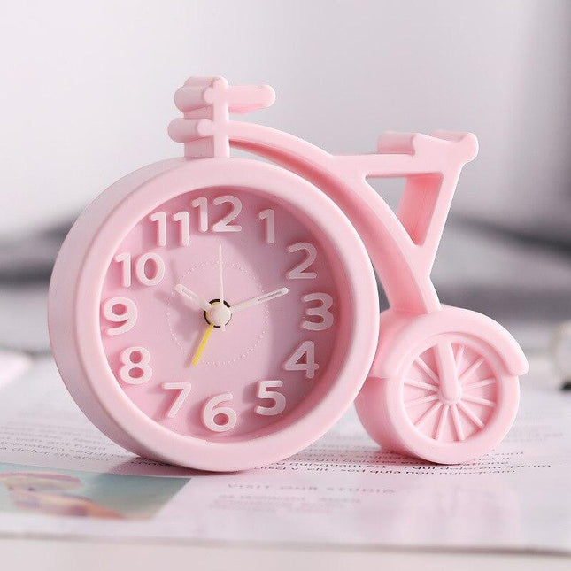 Dekorative kleine Tischuhr als Fahrrad